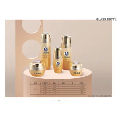 Bộ chai + hũ thủy tinh vàng nắp vàng 120ml – mã NXG0200