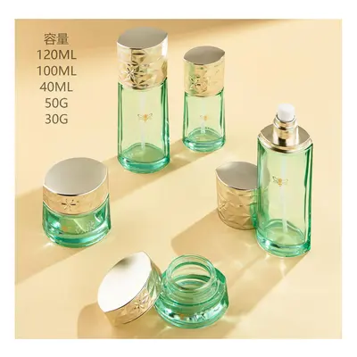 Bộ chai + hũ thủy tinh xanh lá trong nắp vàng – mã NXG0491