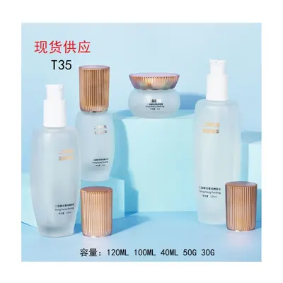 Bộ chai + hũ thủy tinh trắng mờ nắp đồng T35 – mã NXG0503