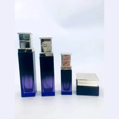 Bộ chai xịt thủy tinh + hũ kem tím than vuông nắp vàng 120ml – mã NXG0631