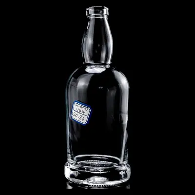 Chai rượu thủy tinh cổ phình vai tròn 500ml – mã NXW0066